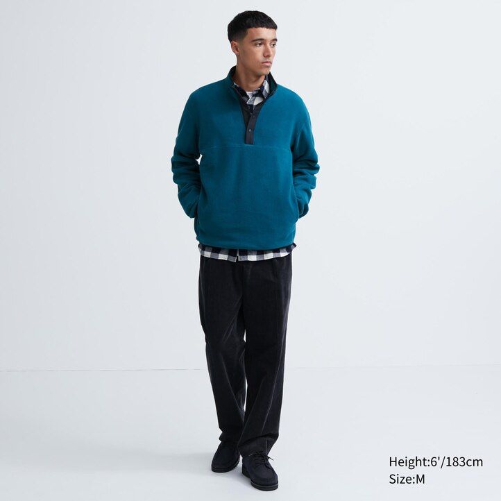 white uniqlo fleece button up pullover mens hoodie on