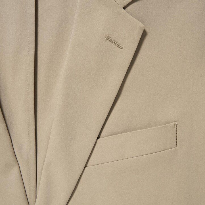 beige mens uniqlo airsense ultra light suits