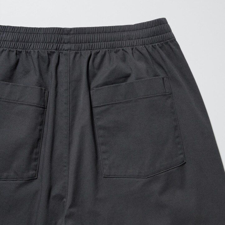 mens uniqlo cotton relaxed fit ankle length trousers dark grey