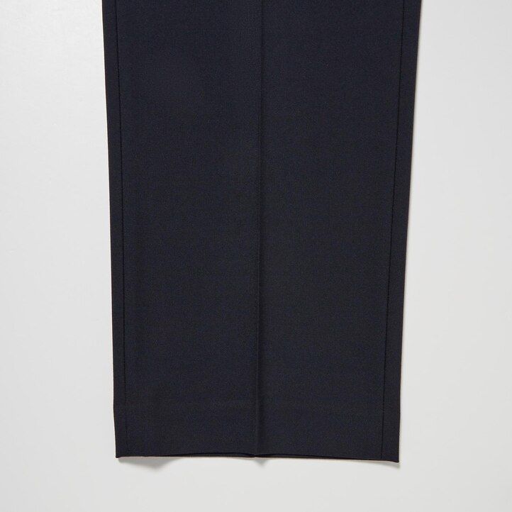 mens uniqlo two way stretch pleated tapered fit trousers beige