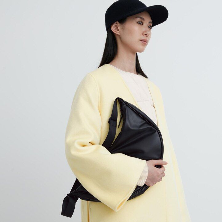 yellow uniqlo round shoulder bag womens bags