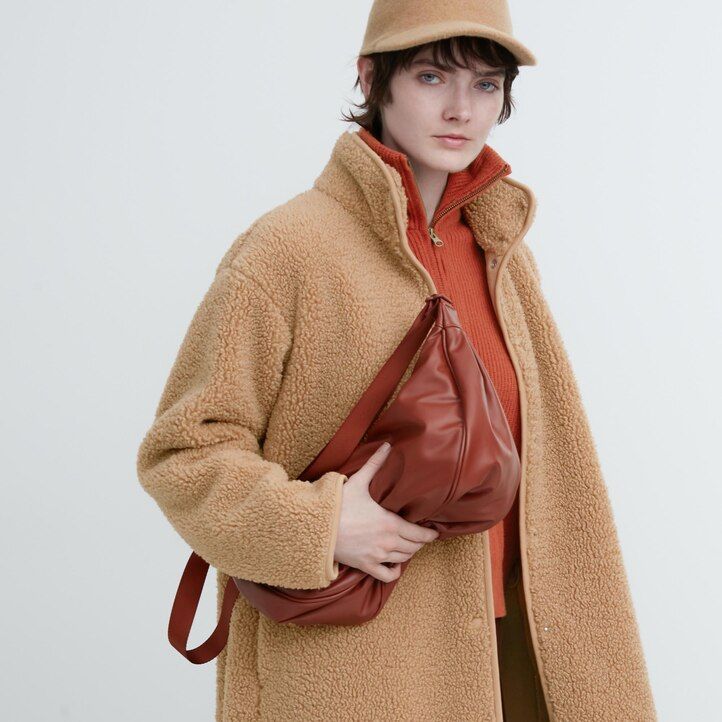 yellow uniqlo round shoulder bag womens bags