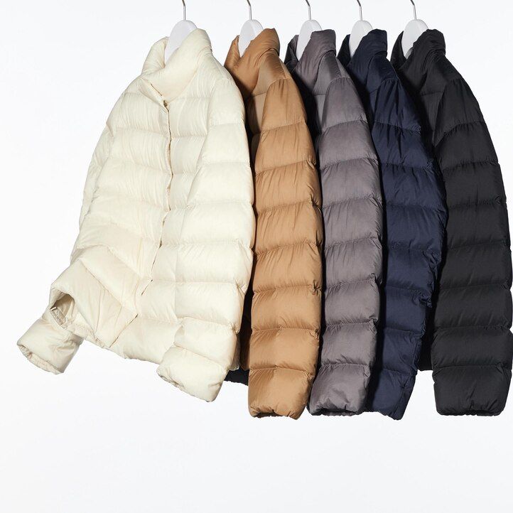 white womens uniqlo ultra light down jackets